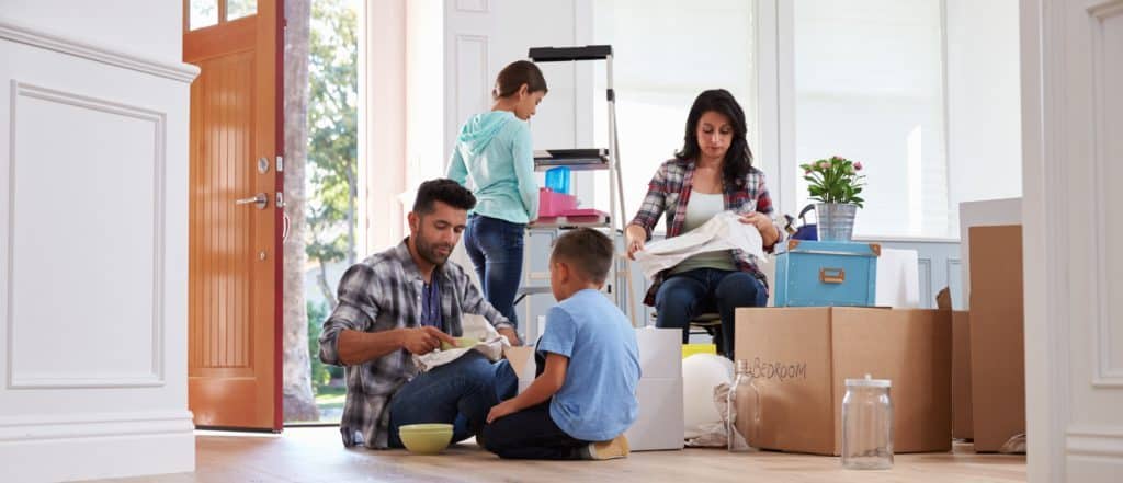 Hispanic Family Moving Into New Home